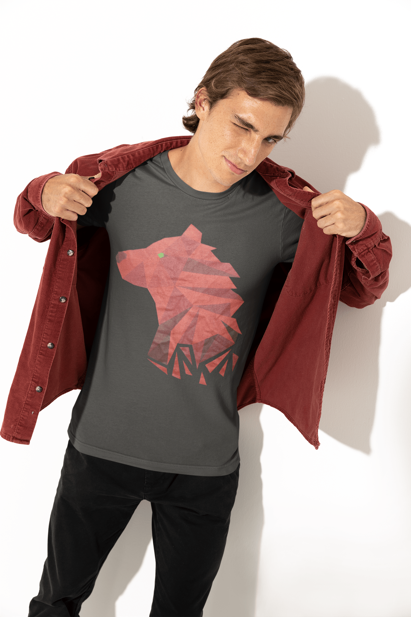 Bella+Canvas 3001 Asphalt Tee with Polygonal Bear front and center, featuring a young man showing off in our t-shirt.