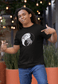 A man pointing at our Bullish/Bearish - Yin Yang - Tribal design, without text, on a black t-shirt.