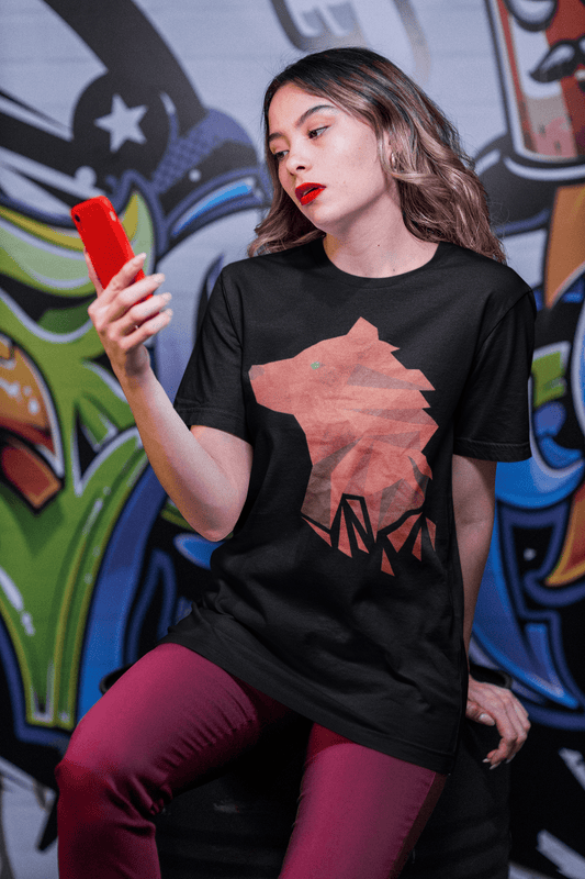 Bella+Canvas 3001 Black Tee with Polygonal Bear front and center, featuring woman on phone with an art backdrop.